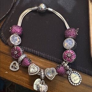 Pandora multi strand bracelet and charms